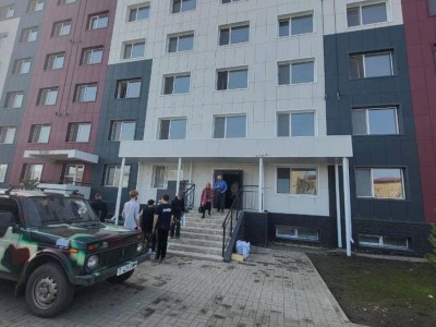 Переселение пострадавших от паводка в новое общежитие.