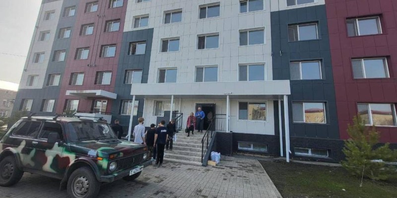 Переселение пострадавших от паводка в новое общежитие.